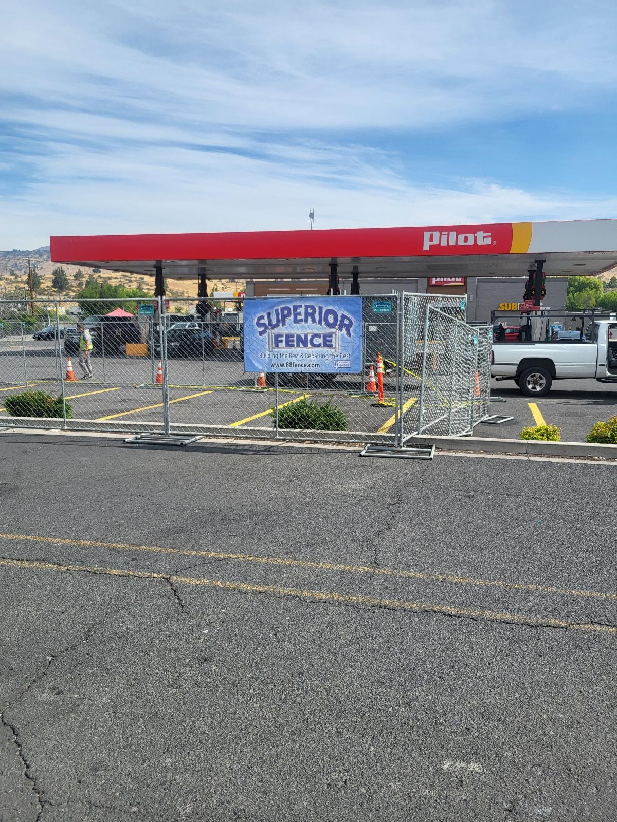 Superior Fence temporary panels at a Pilot gas station commercial project