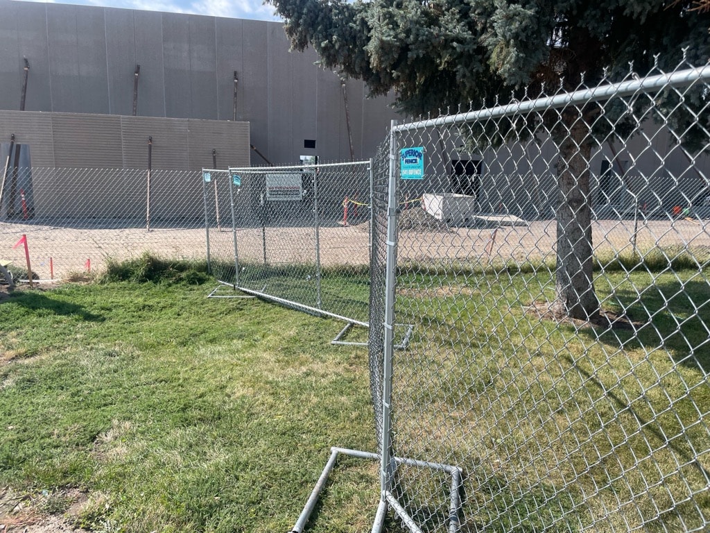 Superior Fence temporary panels securing a commercial building demolition site